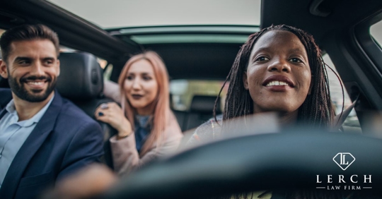 group of adult friends in car