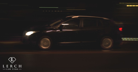 car driving fast at night